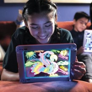 girl tracing on her magic pad