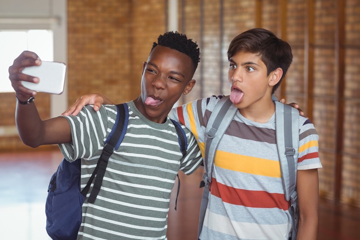 Image of teen boys posing for a selfie