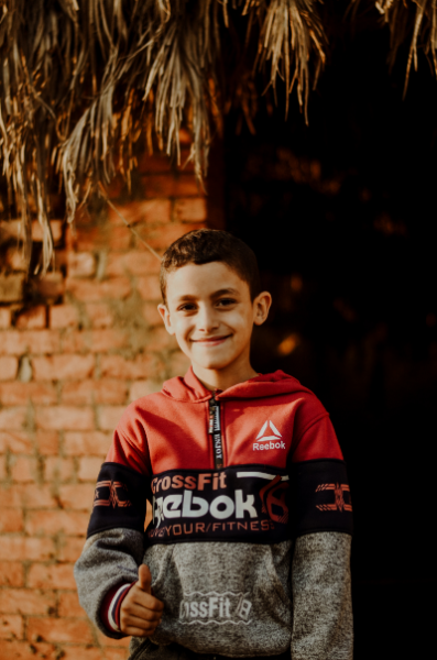 Image of a 9 Year Old Boy Smiling for the camera